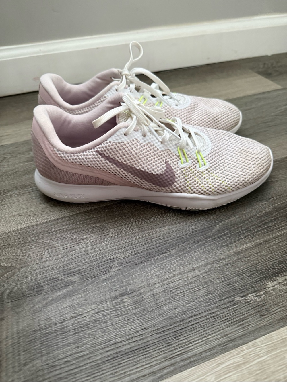 Nike Women’s Light Pink Mesh Training Sneakers with Subtle Plum Swoosh